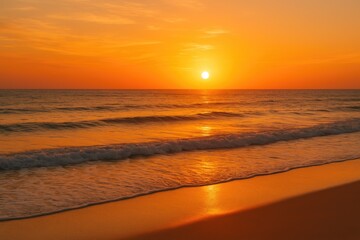 Obraz premium Stunning sunset with vibrant orange hues over the shoreline