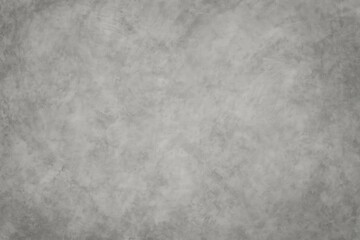 Fototapeta premium Textured abstract background featuring a grunge-style concrete surface and a neutral gray backdrop