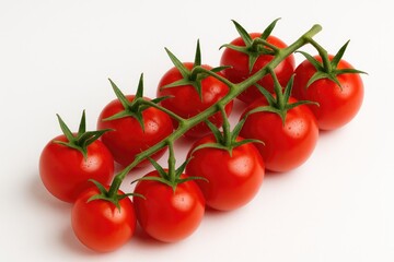 Detailed shot of ripe cherry tomatoes attached to a branch against a white background