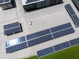 Aerial view of parking space with solar canopies