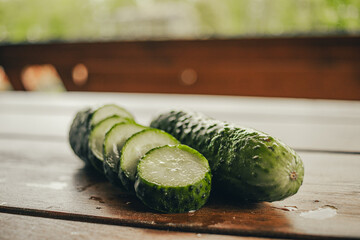 cucumber on wooden board