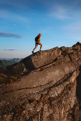 Active man trail running on mountain ridge in Norway travel hiking adventure outdoor, healthy...