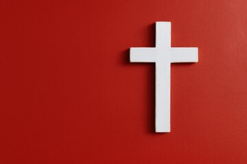 Obraz premium Red wall featuring a Christian cross