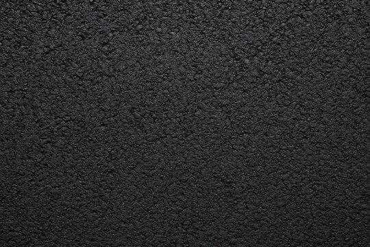 Deep black vibrant asphalt surface for background