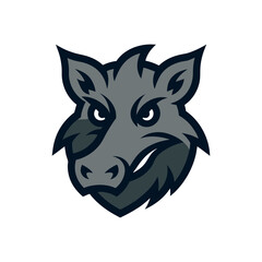 A Fierce Wild Boar Head Mascot Logo Design with Large Prominent Tusks for a Team