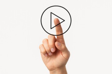 User pressing a play/pause button with a hand on a white surface