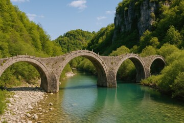 Fototapeta premium Photo of a historic stone bridge in a mountainous village
