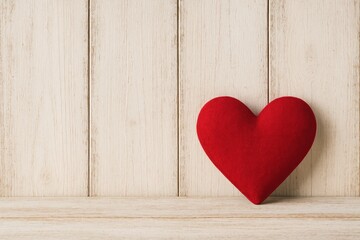 Valentine's Day tribute featuring a white wooden fence and a red heart