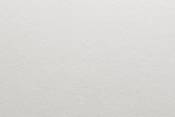 Obraz premium Detailed close-up of a textured white paper surface