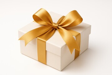 Elegant gift package adorned with a shimmering gold ribbon isolated on a plain white backdrop