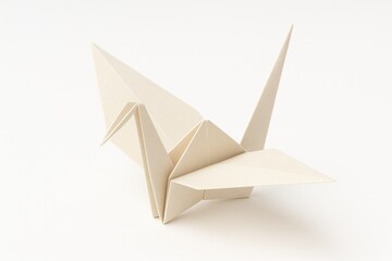 Crafted paper crane showcasing traditional artistry with a soft color palette on a luminous white background