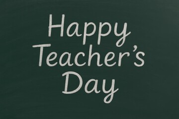 Celebrating Educators: A Handwritten 'Happy Teacher's Day' Note on a Blackboard
