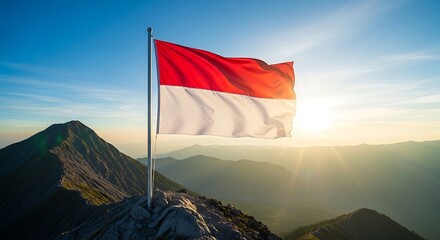 Indonesian flag waving atop a mountain peak against a bright blue sky and sunrise.