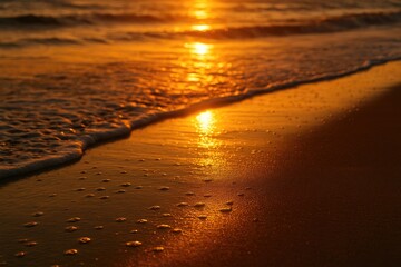 Sunset with a golden glow over the ocean shoreline