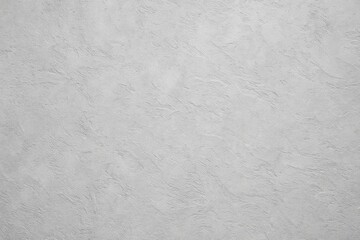 Obraz premium Textured wall surface with gray cement and plaster, featuring a concrete and wallpaper pattern backdrop