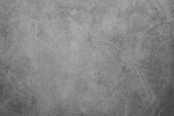 Textured gray concrete surface with an aged, distressed appearance for abstract design