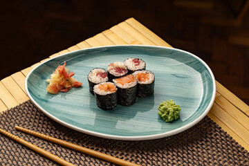 Delicious tuna and salmon hosomaki rolls