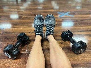 dumbbells on a wooden background