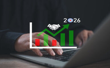 Professional working on laptop with overlay of growth bar chart, handshake icon, and target year...