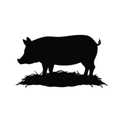 Silhouette of a pig standing on a bed of straw and hay