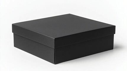 Naklejka premium Single closed matte black square gift box isolated on white background for product packaging mockup or branding presentation