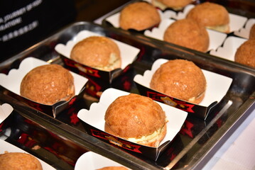 Several boxed of pineapple buns. A classic Cantonese snack.
