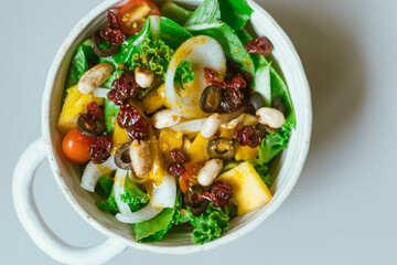 Delicious fruit salad and different fruits, healthy food concept