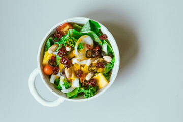 Delicious fruit salad and different fruits, healthy food concept