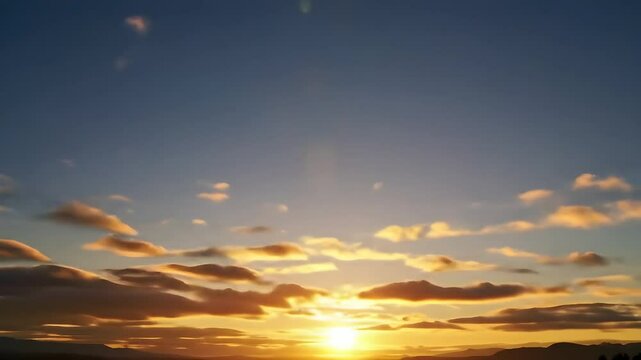 Golden sunset sky with glowing clouds and dramatic horizon scenery