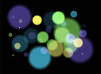 Colorful blurred circles on dark background with smooth soft edges. Overlapping glowing bokeh creates dreamy abstract depth and festive atmosphere without clear focal point.