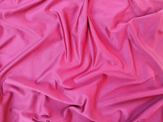 Abstrack red silk wavy fabric texture background 