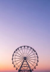 Fototapeta premium Ferris Wheel Against Pastel Sunset Sky