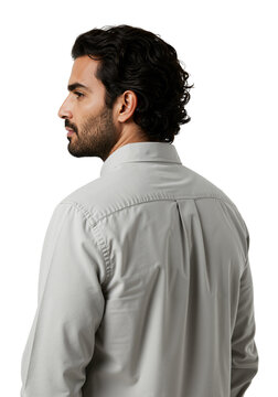 Profile of a handsome young man with a beard looking over his shoulder. Rear view of a model in a gray shirt against a transparent background.