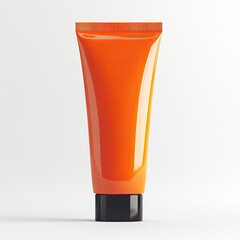 Orange cosmetic tube with black cap isolated on white background