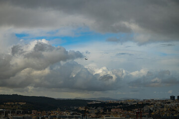 Airplane over the historic center of Lisbon
