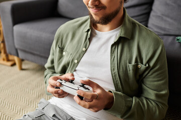 Enjoying a gaming session at home, a young man immerses himself in virtual adventures