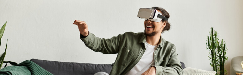 Experience of a young man exploring virtual worlds at home through immersive technology