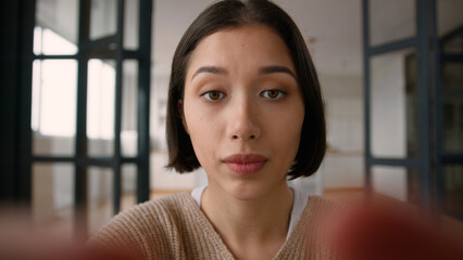 POV point of view Caucasian woman girl influencer social media scrolling mobile phone webcam at...
