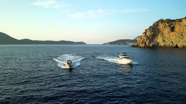 Two Luxury Yachts cruising in the Mediterranean