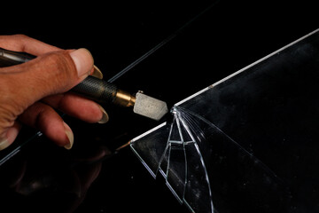 glass cutter in a workshop. 