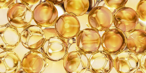 Abstract golden background of cosmetic essence or skin cells. 3D rendering of serum or oil capsules with collagen and vitamin ingredients. Moisturizing liquid gel texture macro view