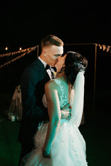 first dance of the bride and groom inside a restaurant