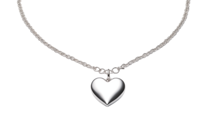 A silver chain necklace featuring a heart shaped pendant against a black colored background view close up