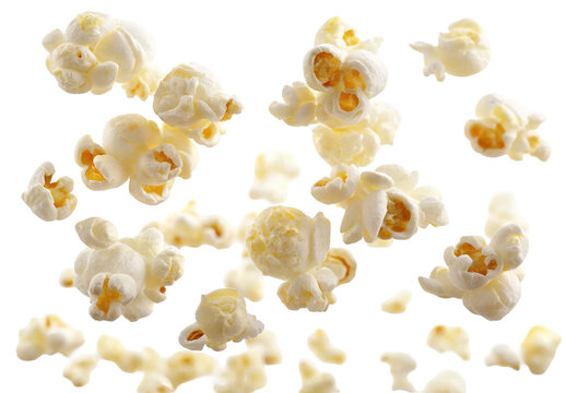 Isolated popcorn kernels floating on black background for movie night snack food photography, 100 characters