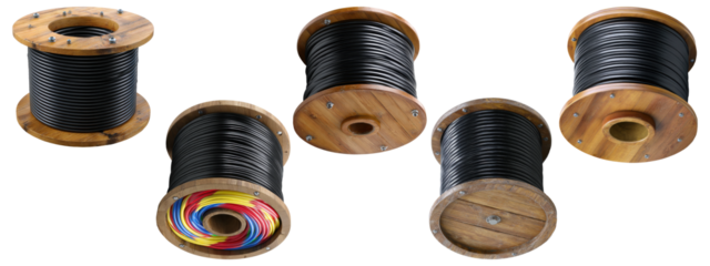 Collection of five wooden spools with black and colorful electrical cables