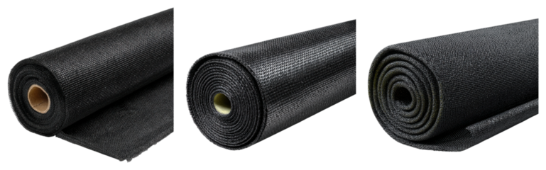 Set of three rolled up black mesh or fabric rolls