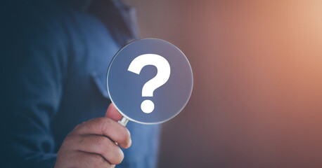 International ask a question day concept, Magnifying glass focused on question mark, Answer, Q&A,...