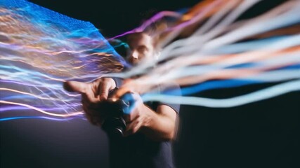 Content creator capturing long exposure light trails in a dynamic studio setup, showcasing creativity and motion in modern media production