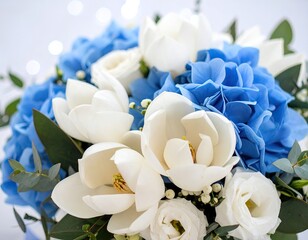 Obraz premium Delicate bouquet of white magnolias and blue hydrangeas