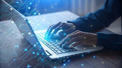 Person typing on a laptop with glowing digital circuit board overlay.